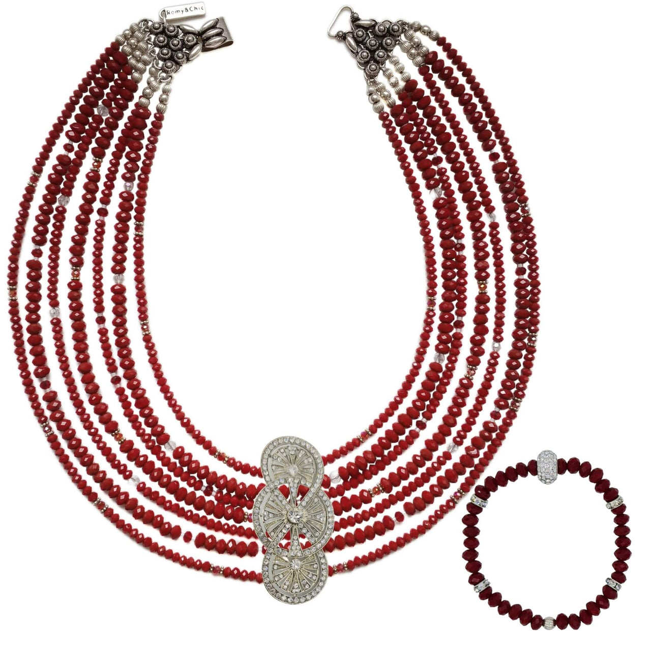 Collar cristal rojo facetado de 6 y 4mm de 7 vueltas. Precioso cierre de plata de ley labrado. Mide 42 cm en su tira más corta. . El broche decorativo es de quita y pon es un regalo incluido en la compra. Dispone de pulsera y pendientes a juego