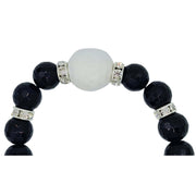 Pulsera de onix facetado negro y bola jade central en blanco